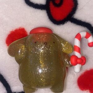 Pompompurin Glittery Gold Figurine with Candy Cane